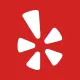 White Yelp logo on a red background