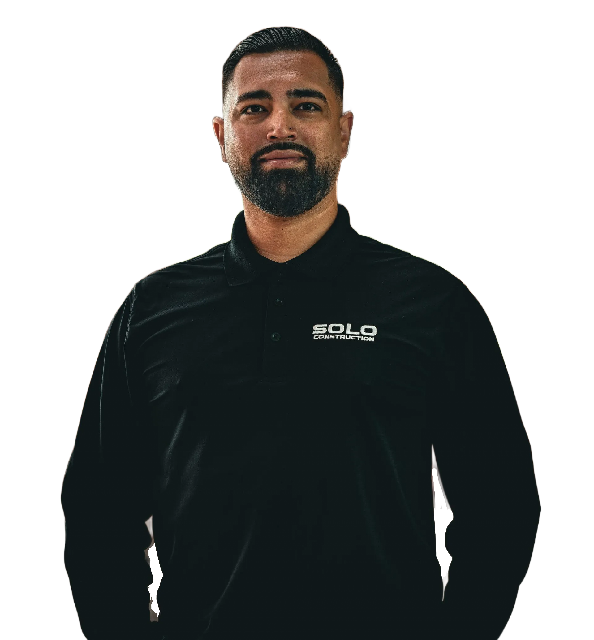 Man in black jacket standing against a white background