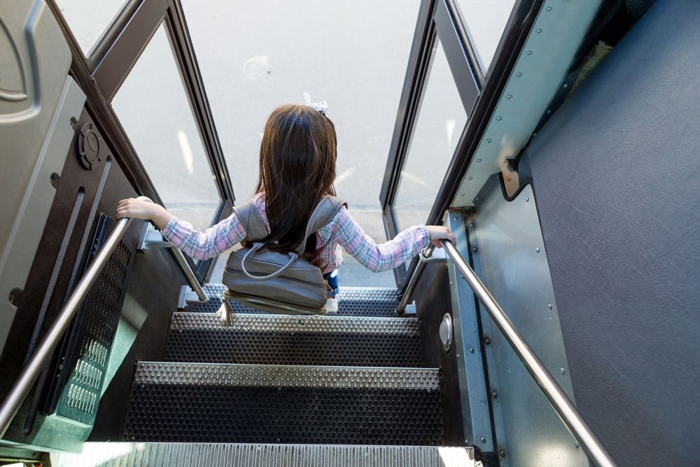 Little Girl Gets Off the Bus — Cotswold Hills, QLD — Robertson's Bus & Coaches