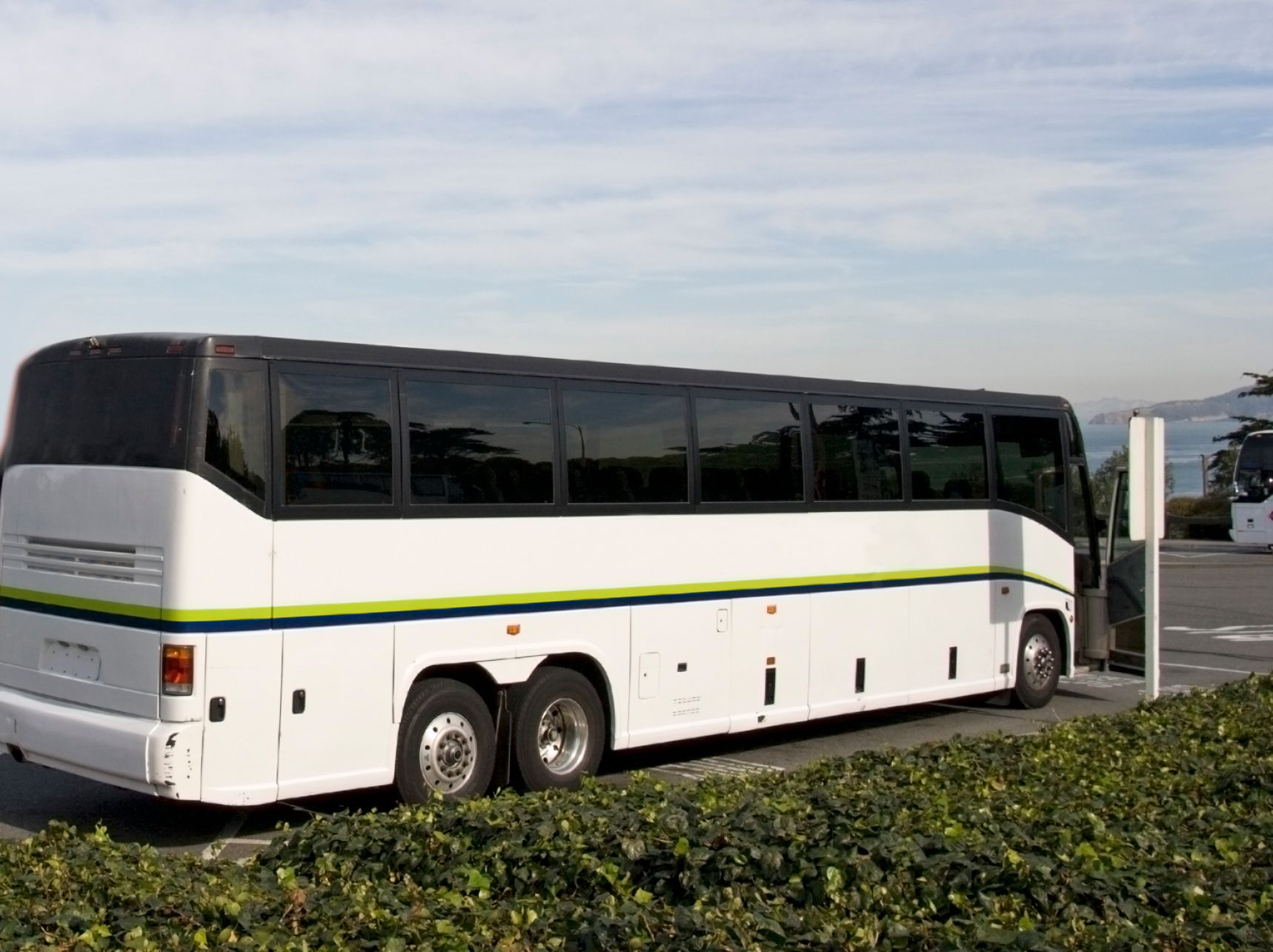 Charter Bus Parked — Cotswold Hills, QLD — Robertson's Bus & Coaches