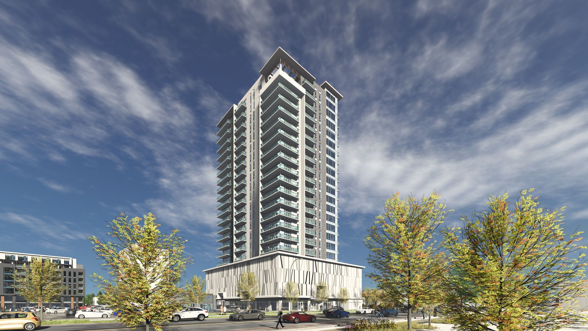 High-rise apartment building on a sunny day, with light gray and white facade, with trees and blue sky.
