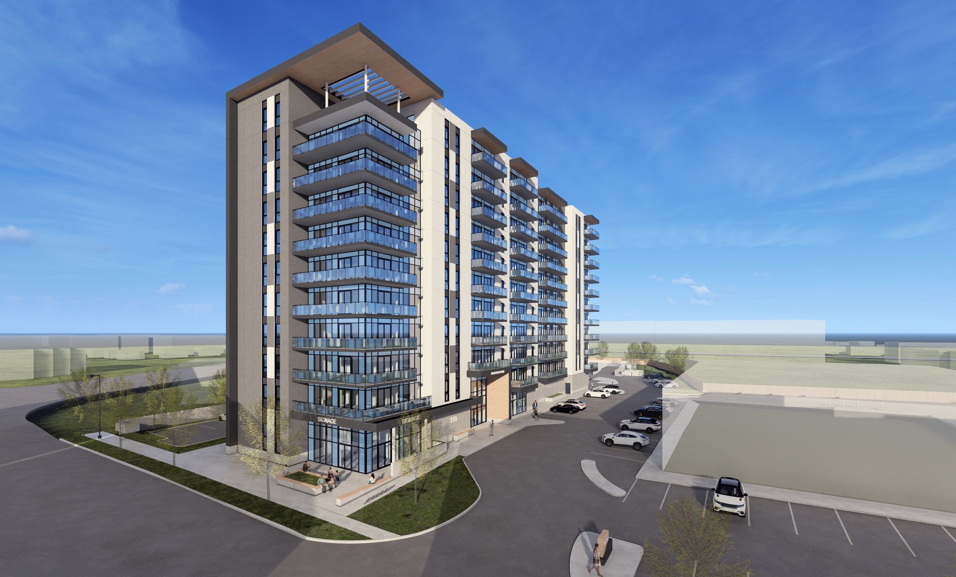 Modern apartment building with glass balconies and a rooftop canopy beside a curving road under a blue sky