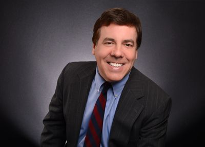 A headshot of Michael Rogers