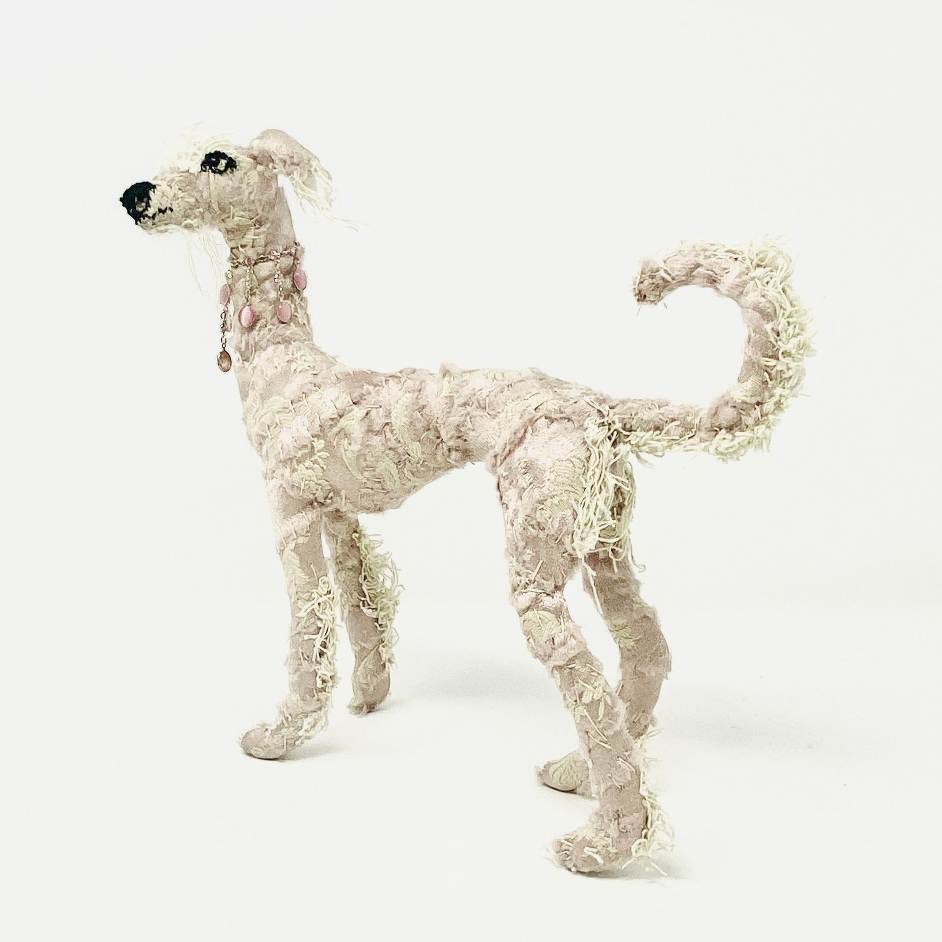 Textile wire sculpture of skinny lurcher hound dog