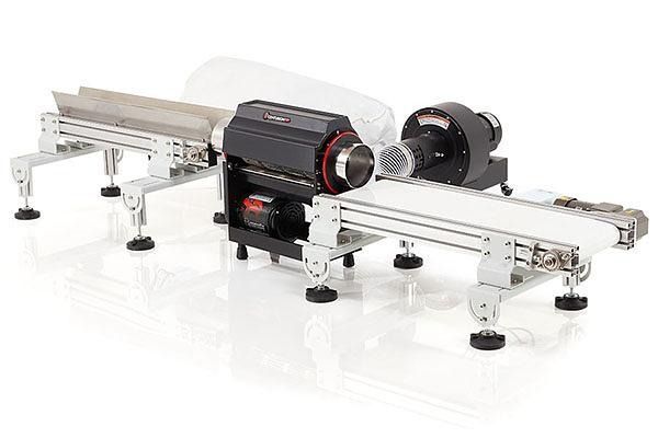 Industrial conveyor system with two black motors on a metal frame and adjustable feet