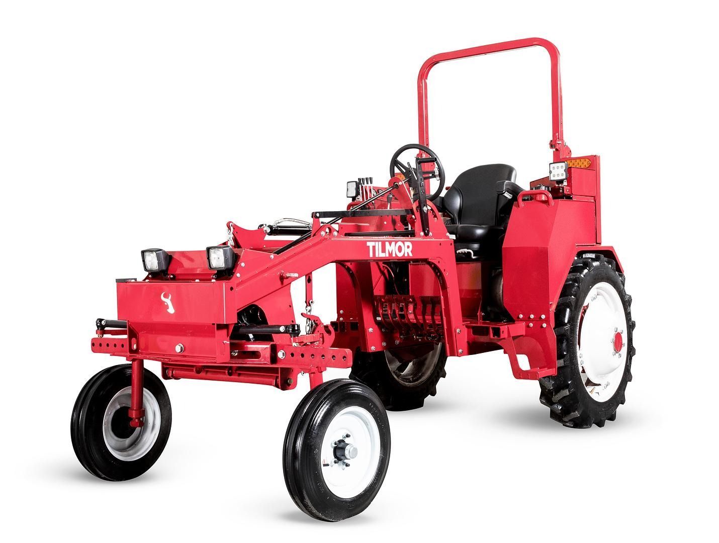 Red vintage tractor with white wheels on a white background