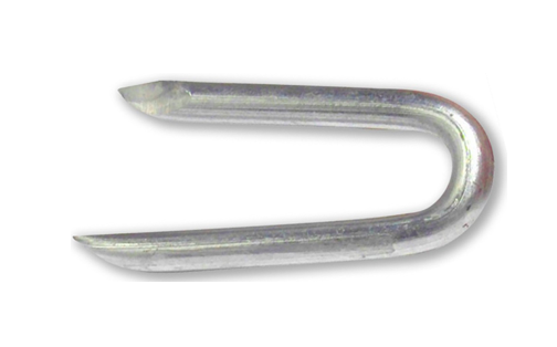 A close up of a metal fencing nail on a white background.