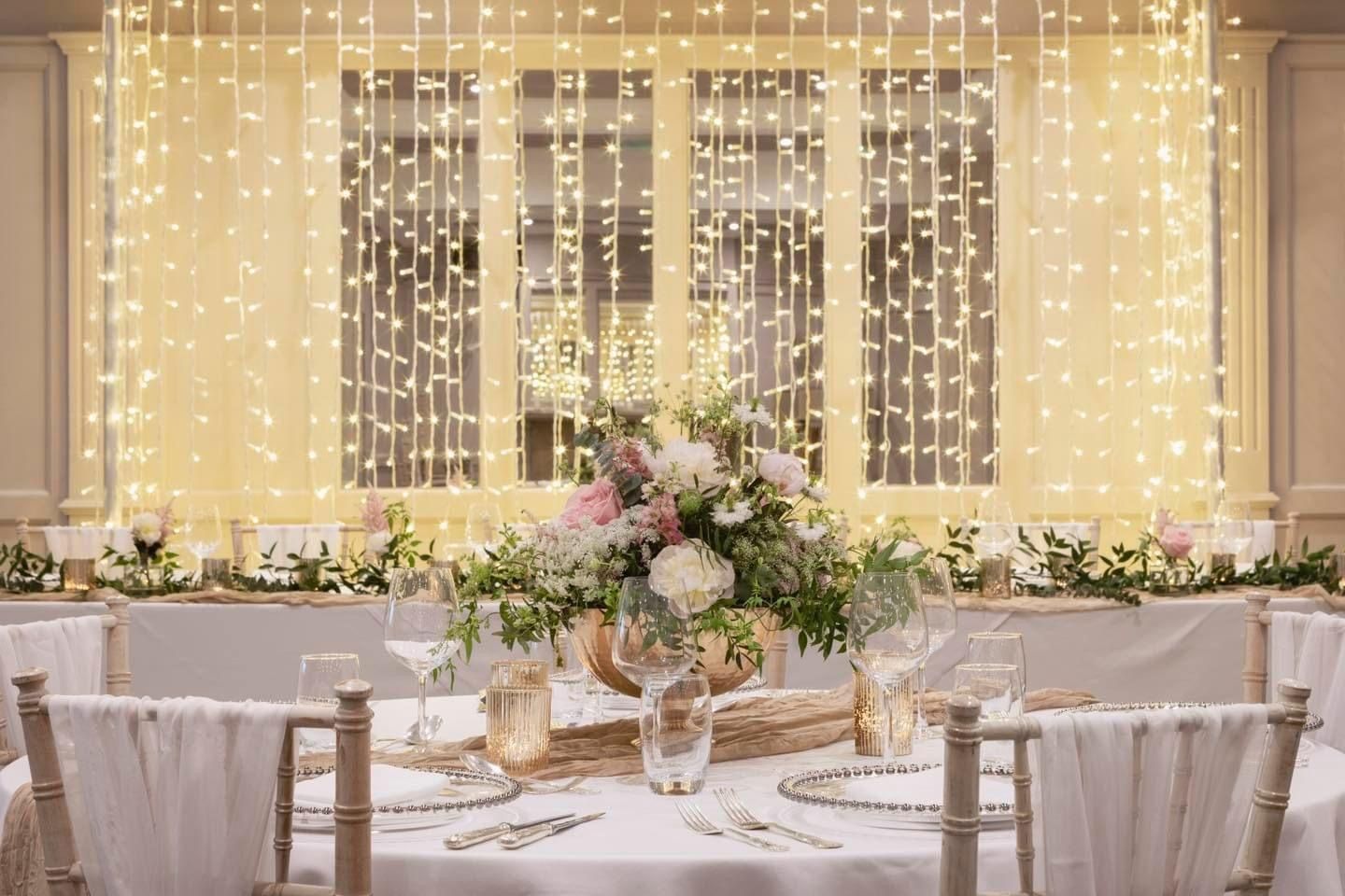 Cute Fairy Light backdrop for classic romantic wedding styling.Exclusive Entertainments, Harrogate, Yorkshire