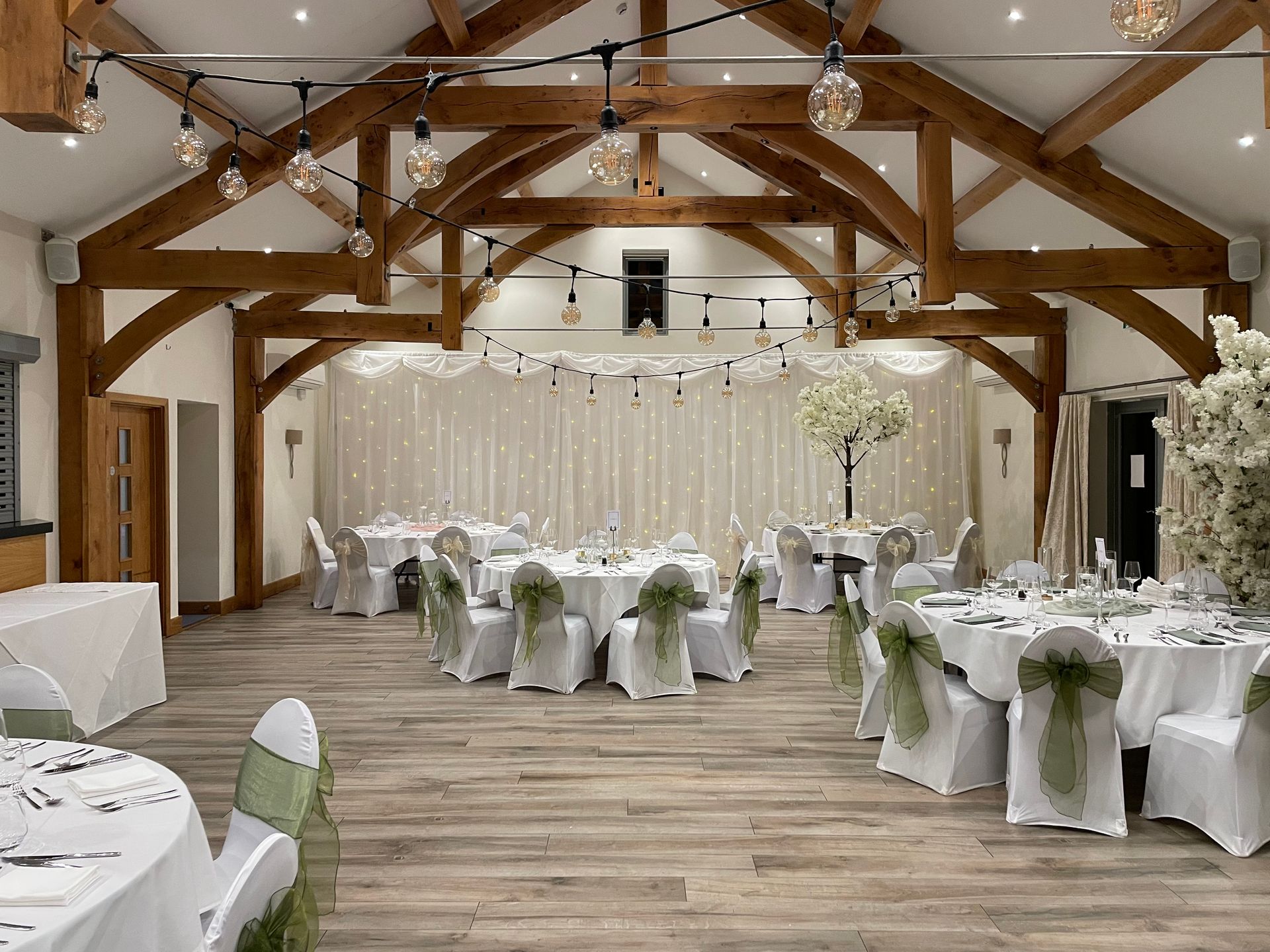 Chic white and soft green styling with lighting from Exclusive Entertainments, Harrogate, Yorkshire
