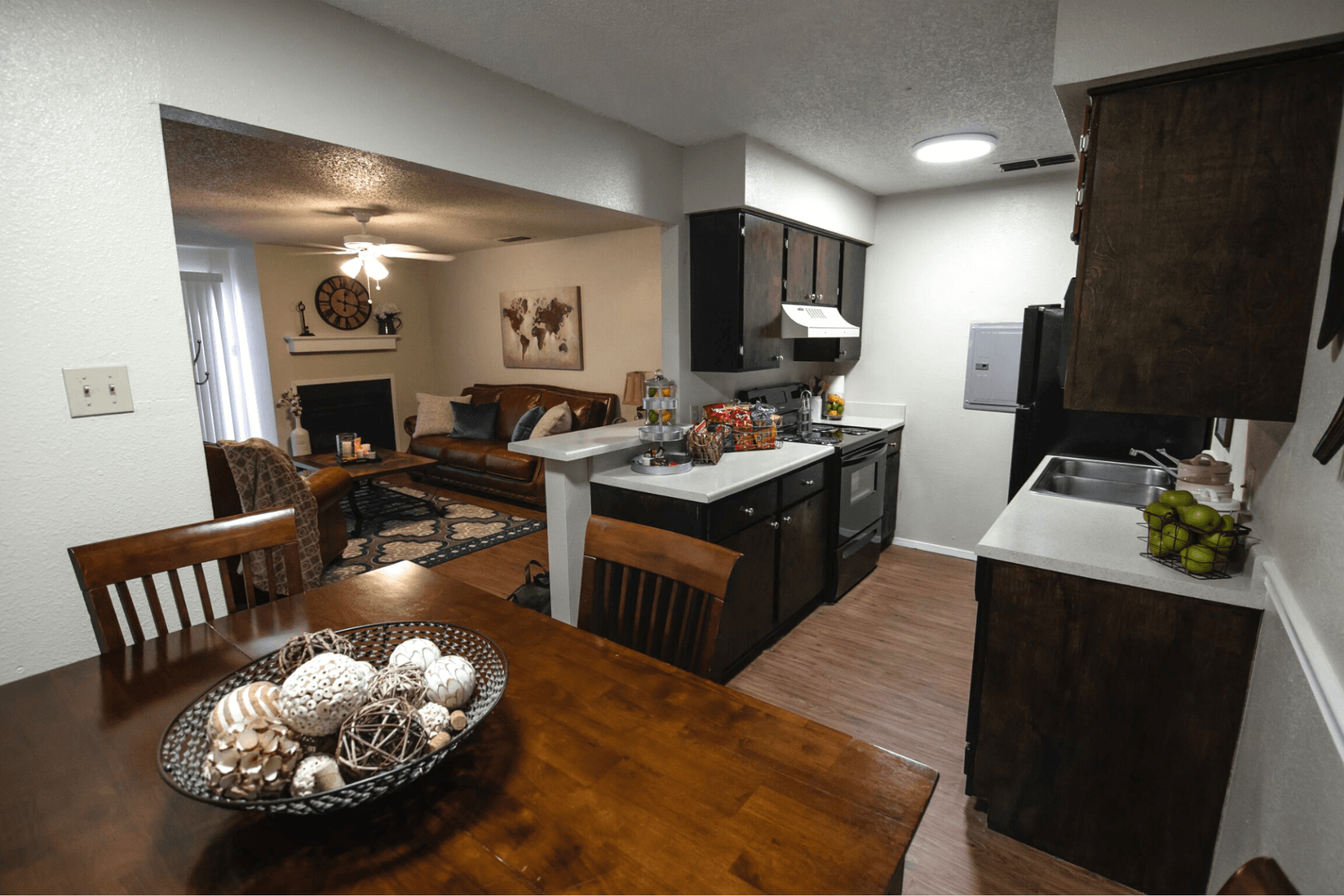 Interior of apartment with hardwood floors and white walls