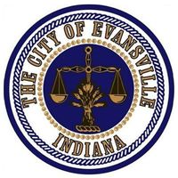 The city seal of Evansville, Indiana, featuring a balance scale over a wheat sheaf in a blue circle with gold text.