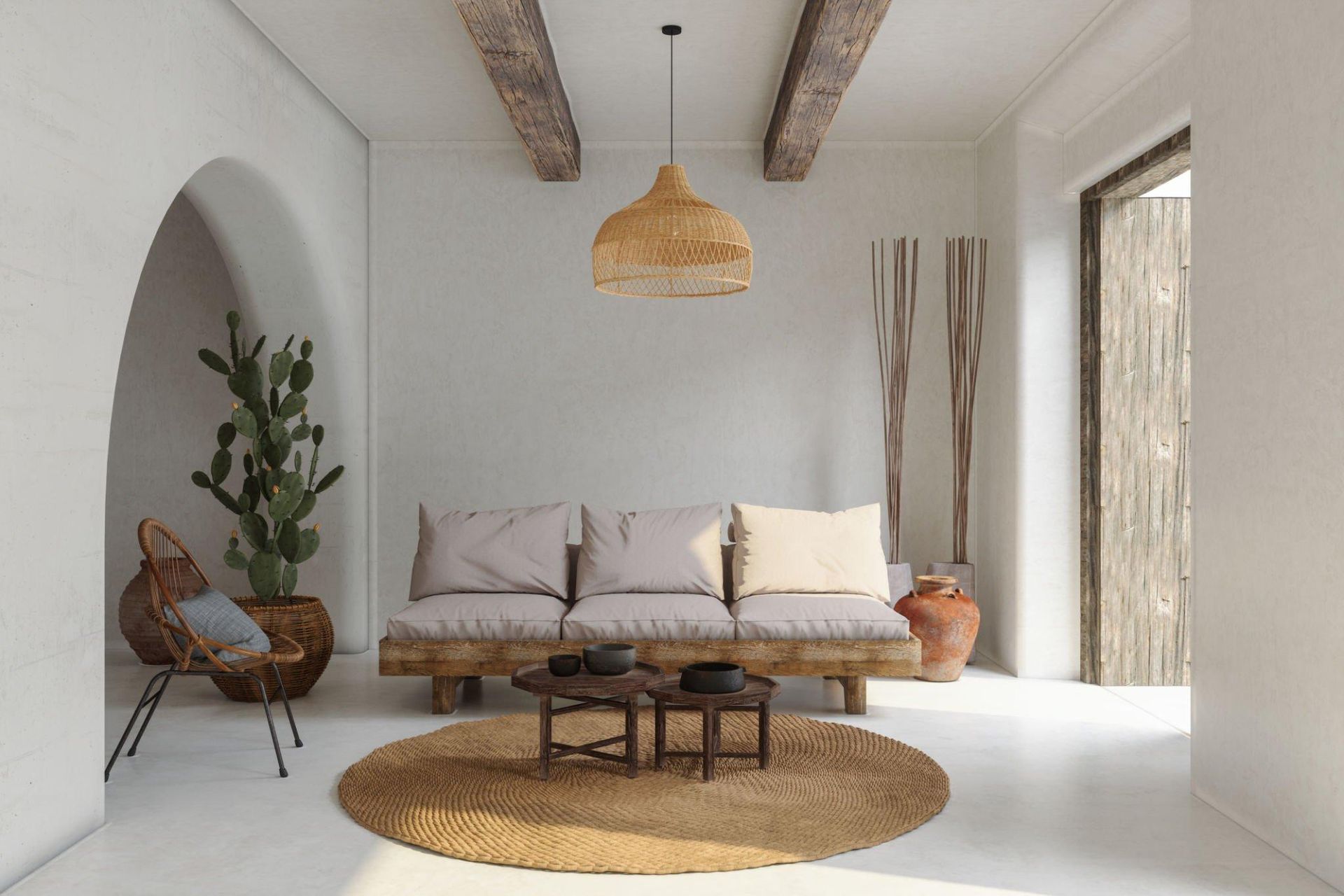 A living room with a couch , two coffee tables , and a rug.