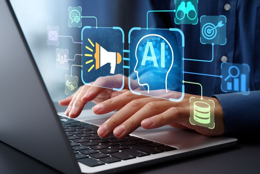 Typing on a laptop with AI and data icons representing AI implementation in business operations and 