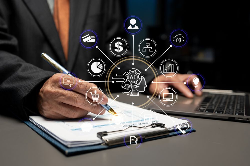 Executive writing AI strategy with icons showing business functions impacted by AI implementation in business. 
