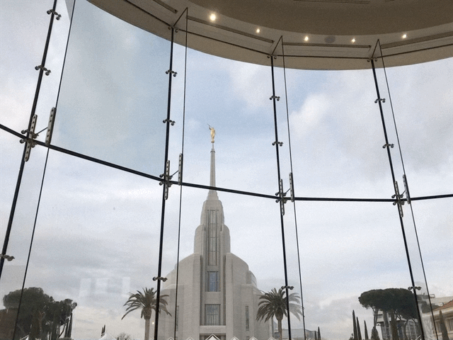 A view of a temple through a glass window