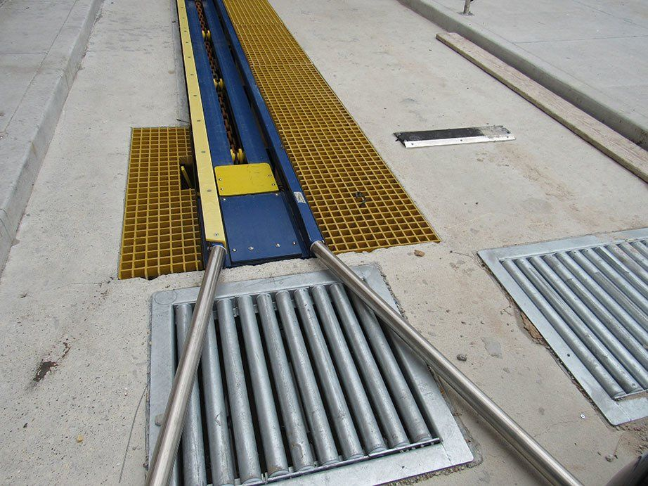 A metal railing with a yellow stripe on it