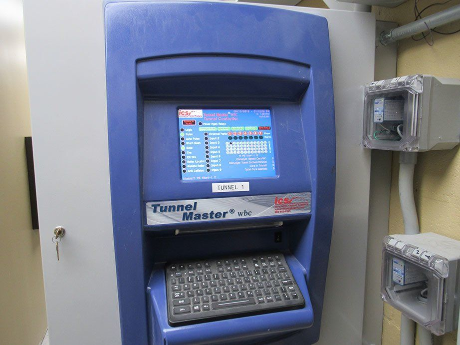 A blue tunnel master machine with a keyboard