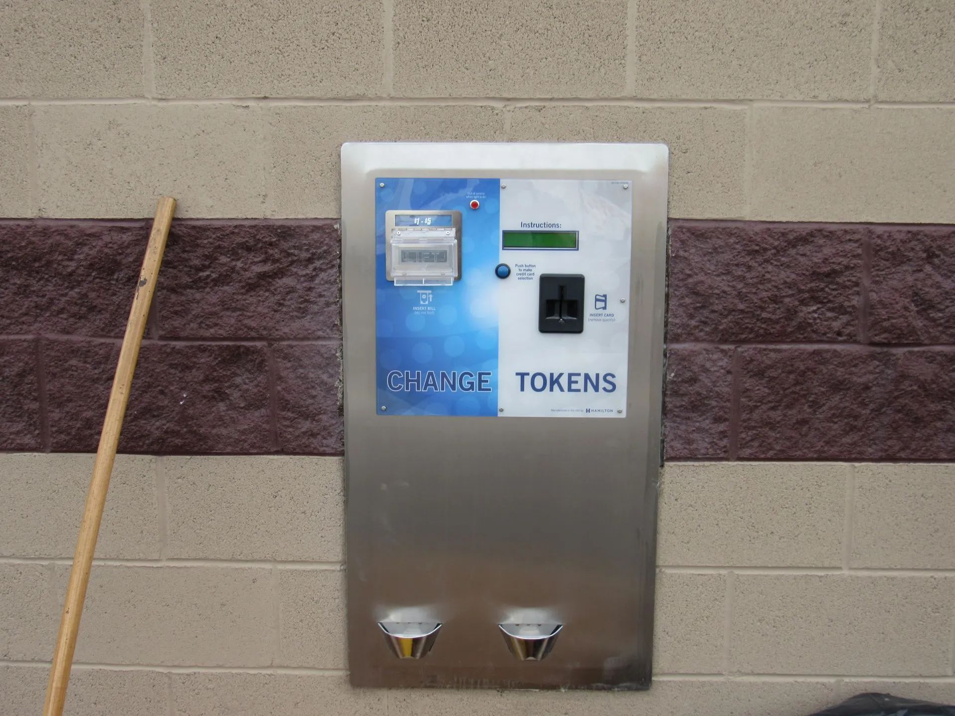 A machine that says change tokens on it