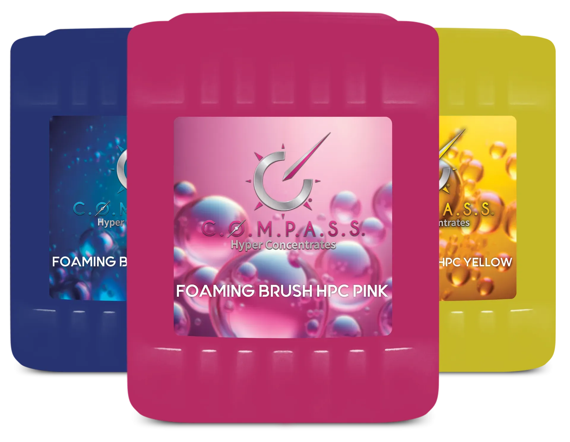 Three colorful Compass foaming brush cleaner packets: blue, pink, and yellow.
