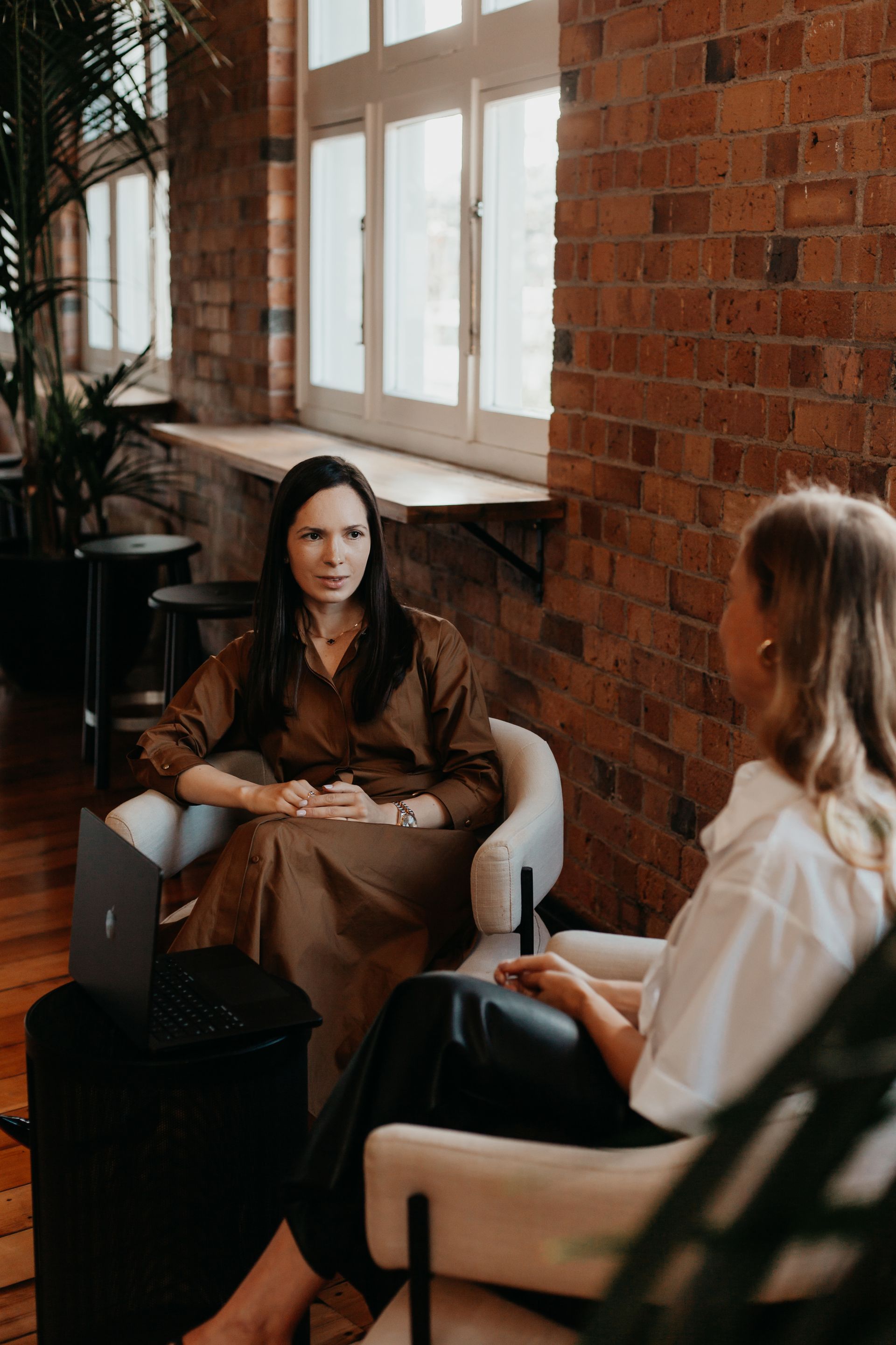 Polina Kozlova meeting a client at the PK Law office in Auckland