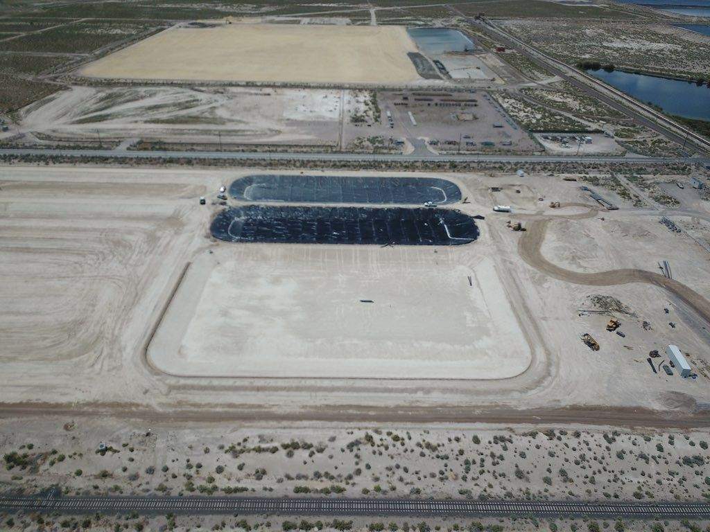 Aerial view of black plastic cover a large pond-sized area