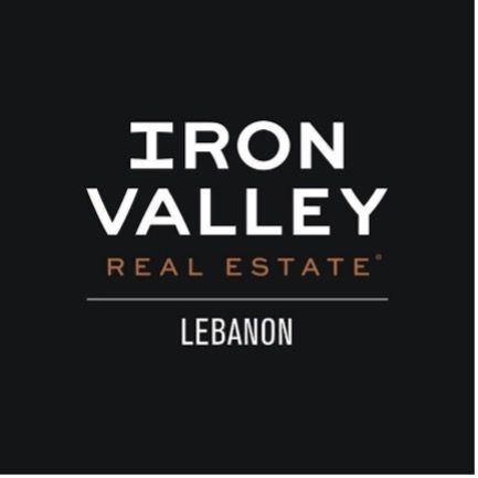 The logo for iron valley real estate in lebanon