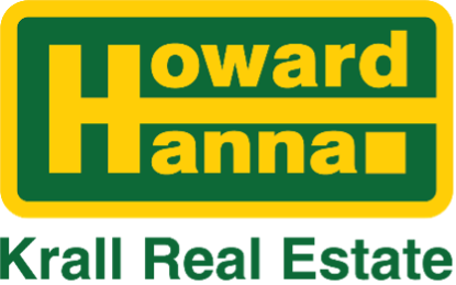 A green and yellow howard hanna krall real estate logo