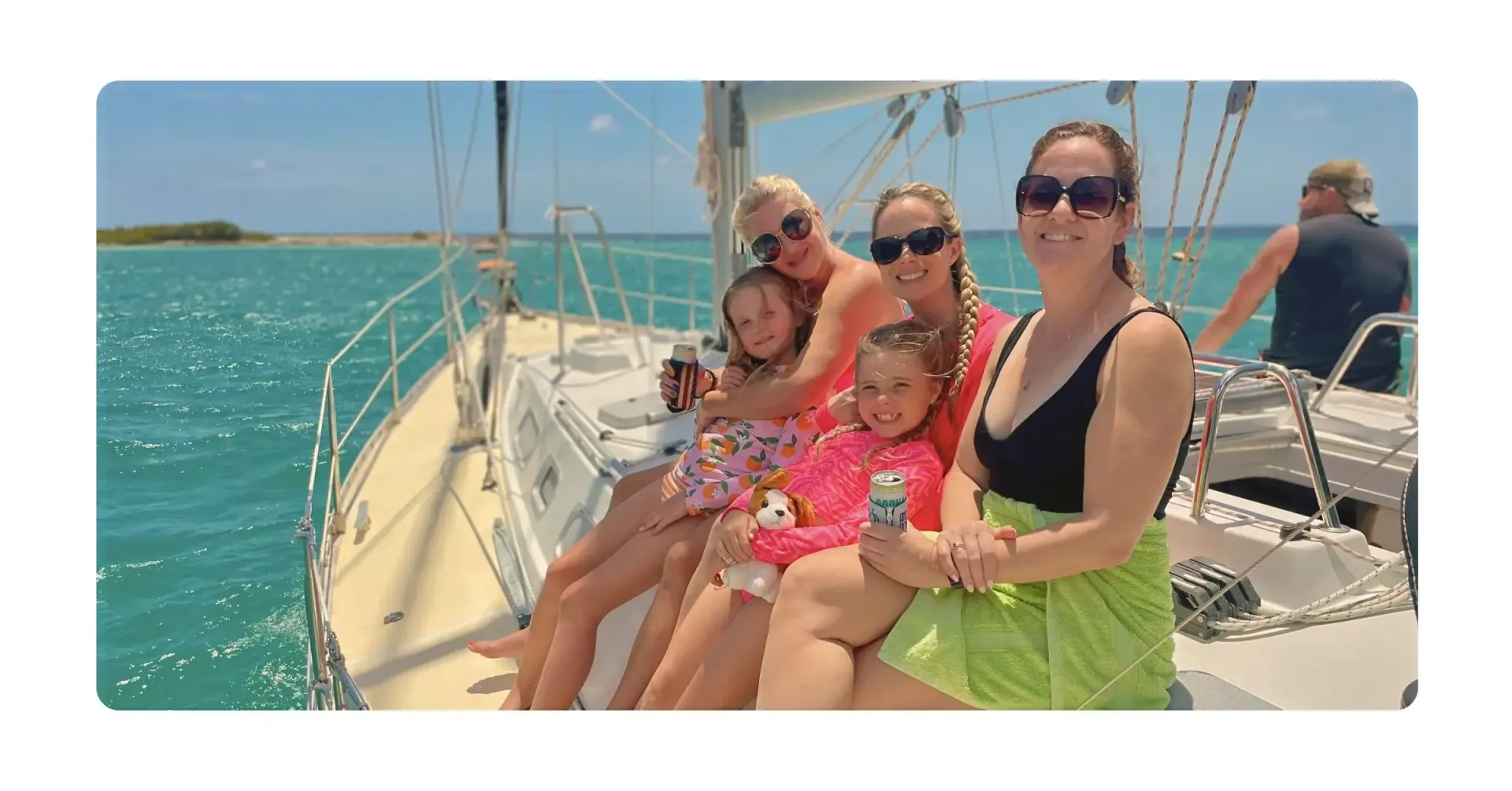 family on sailing yacht Galaxie, during private boat trip in Curacao. Sunny day, all smiling.