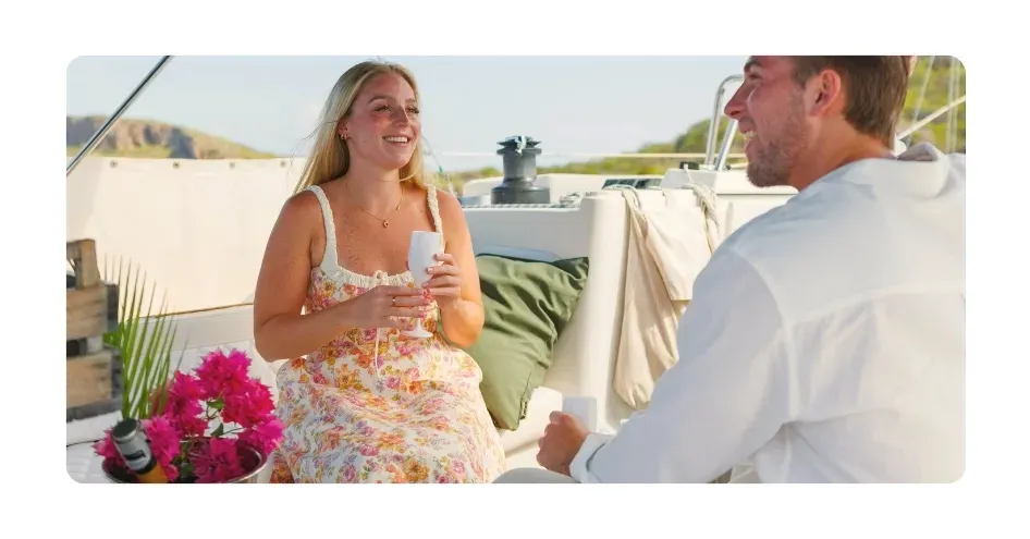 happy couple enjoying private atmosphere onboard sailing yacht galaxie booked through travel advisors program