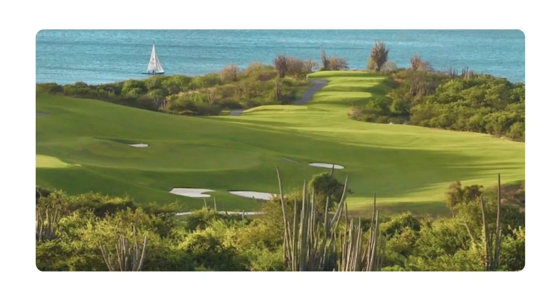 green Old Quarry Golf Course overlooking Caribbean Sea and Maxie Sailing boat trips