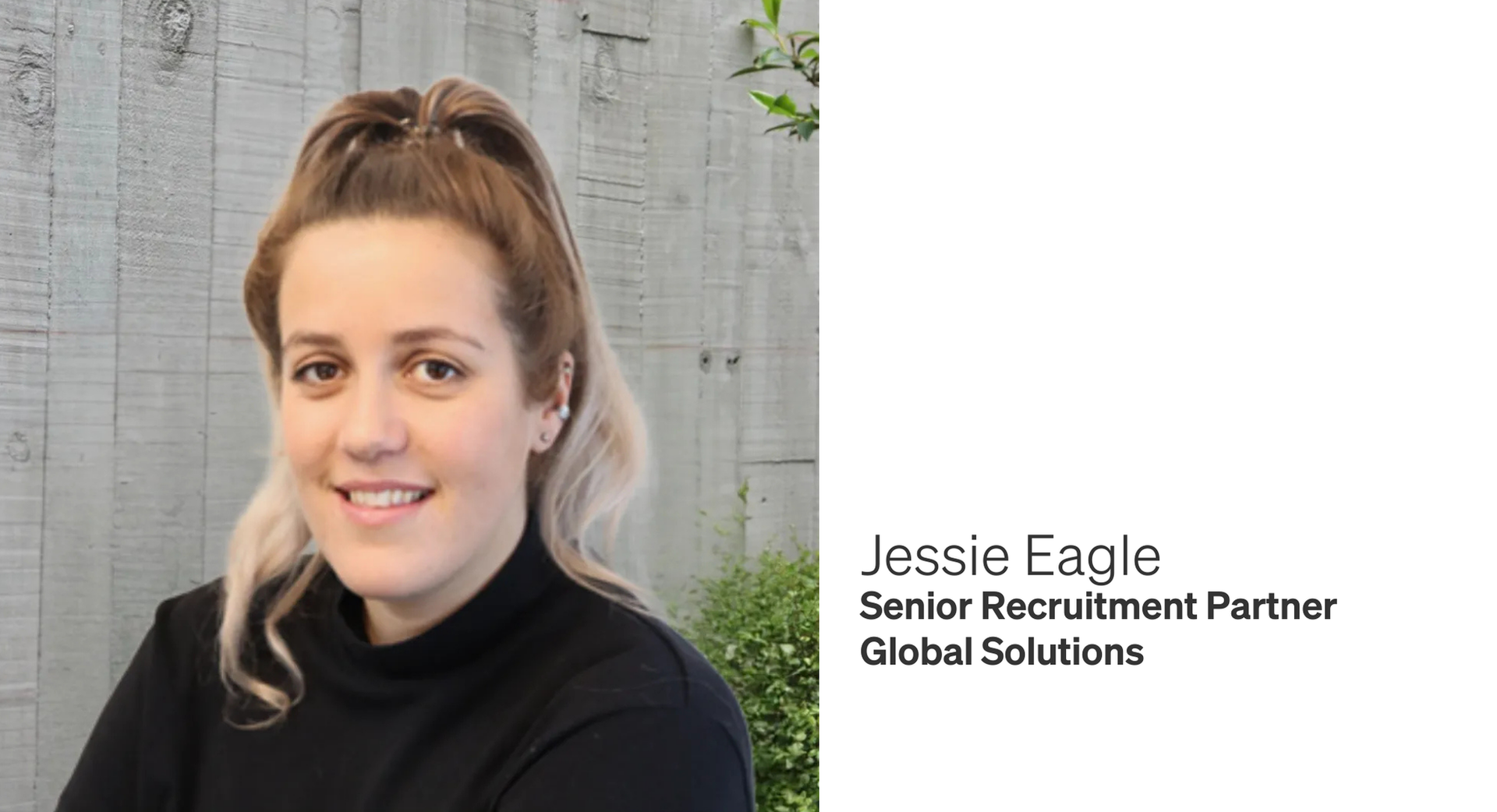 Jessie Eagle, Senior Recruitment Partner, smiling in front of a neutral-colored wall.