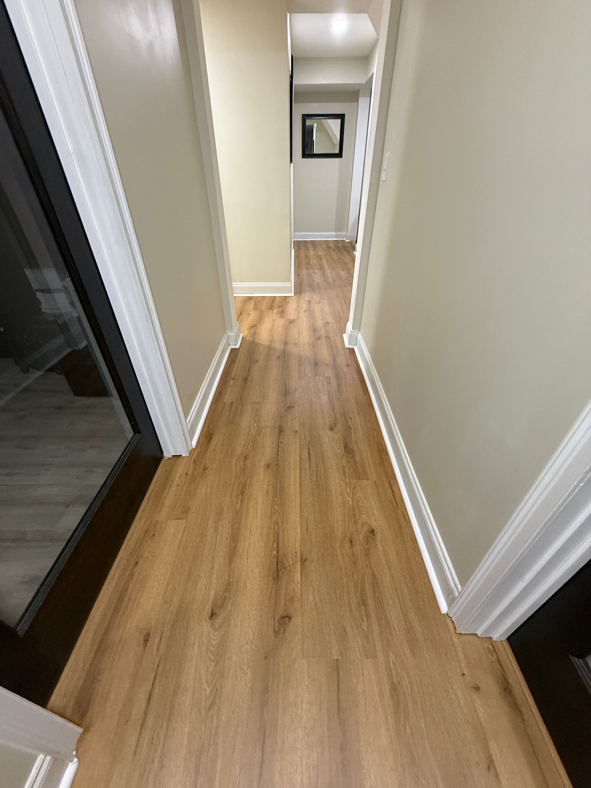 6.5mm Luxury Vinyl Plank, Animal Farm - Installed by Martin's Master Flooring