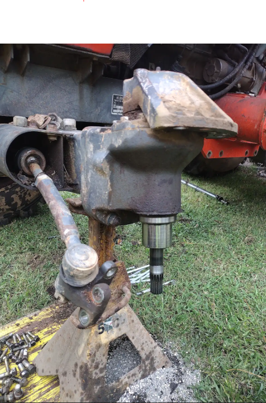 Mechanic servicing a lawn mower