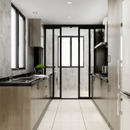 Modern narrow kitchen with light wood cabinets, black-framed glass door, and white tile floor