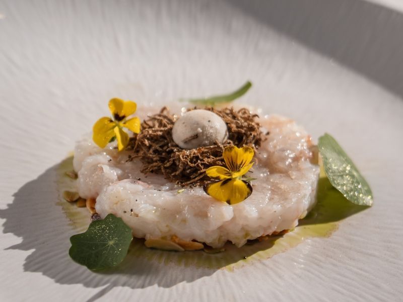 Piatti di pesce fresco serviti al ristorante pesce a Senigallia Pulcinella