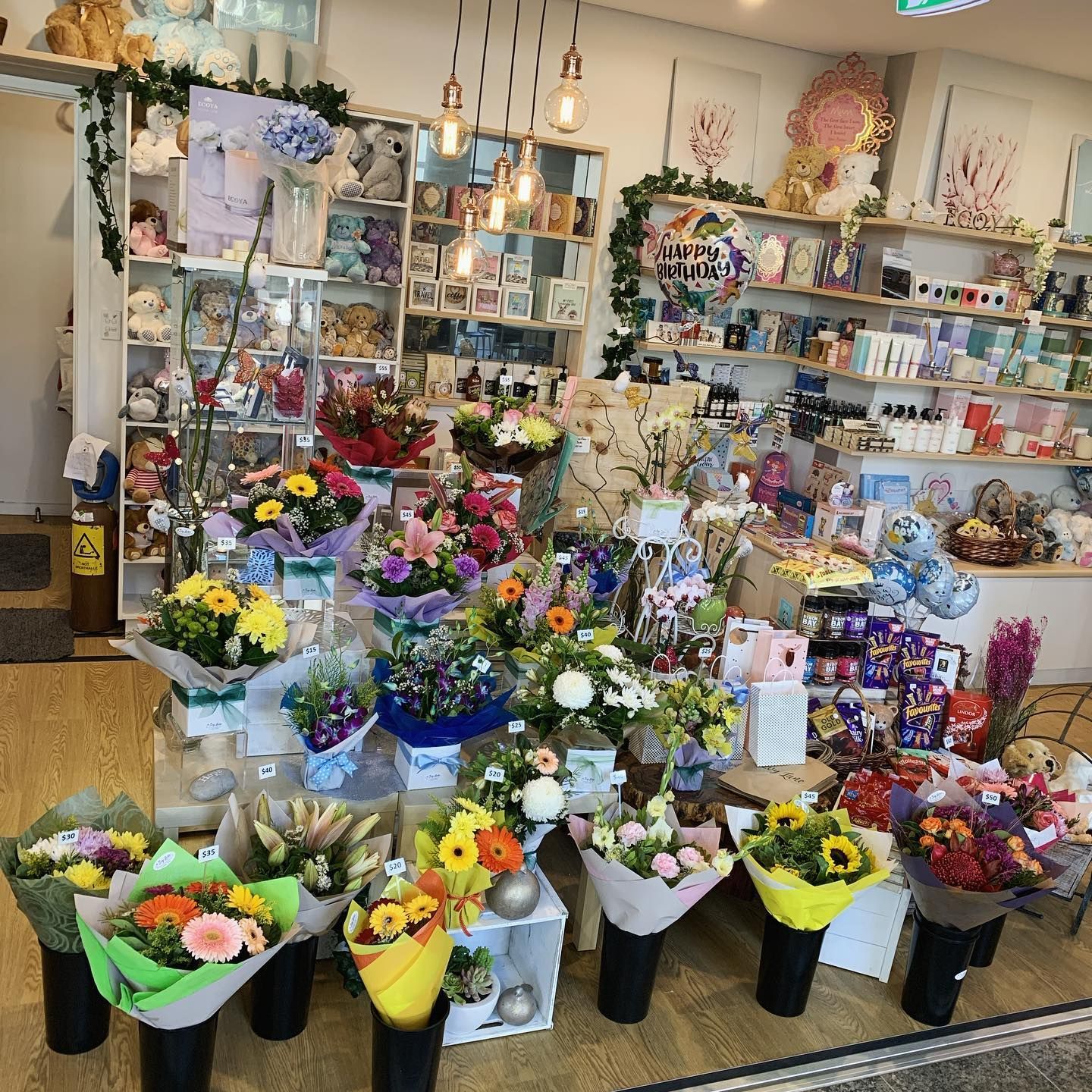 Flower Shop Interior: Bouquets, Gifts, Shelves With Items — Ivy Lane Flowers & Gifts in Birtinya, QLD