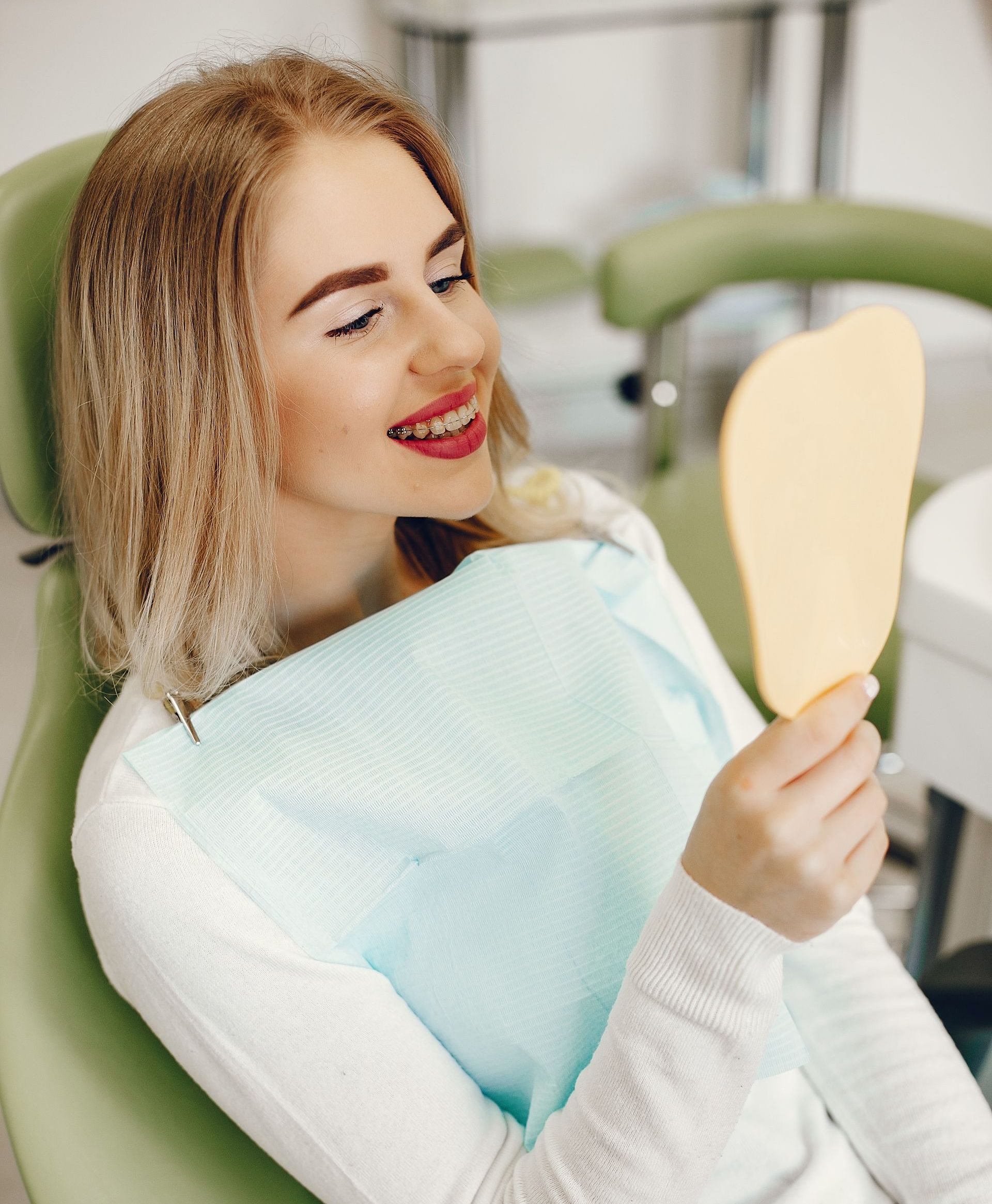 Get sleep apnea therapy, gum disease treatments, and dentures. woman with mouth open | family dentist for kids and adults in Somerset NJ