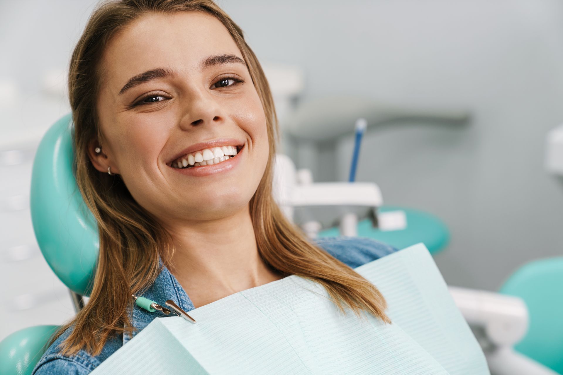 Perfect smiles with cosmetic dental bonding in Somerset, NJ. woman smiling after getting cosmetic dental bonding | MetLife, Aetna, Cigna dentist near Somerset, NJ