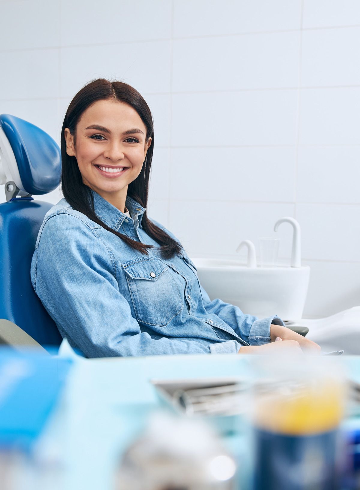 Visit our general dentist for tooth extractions, sealants, cleanings, and more. man smiling in dentist chair | general dentist for cleanings, fillings, and even fixing sleep apnea | somerset NJ