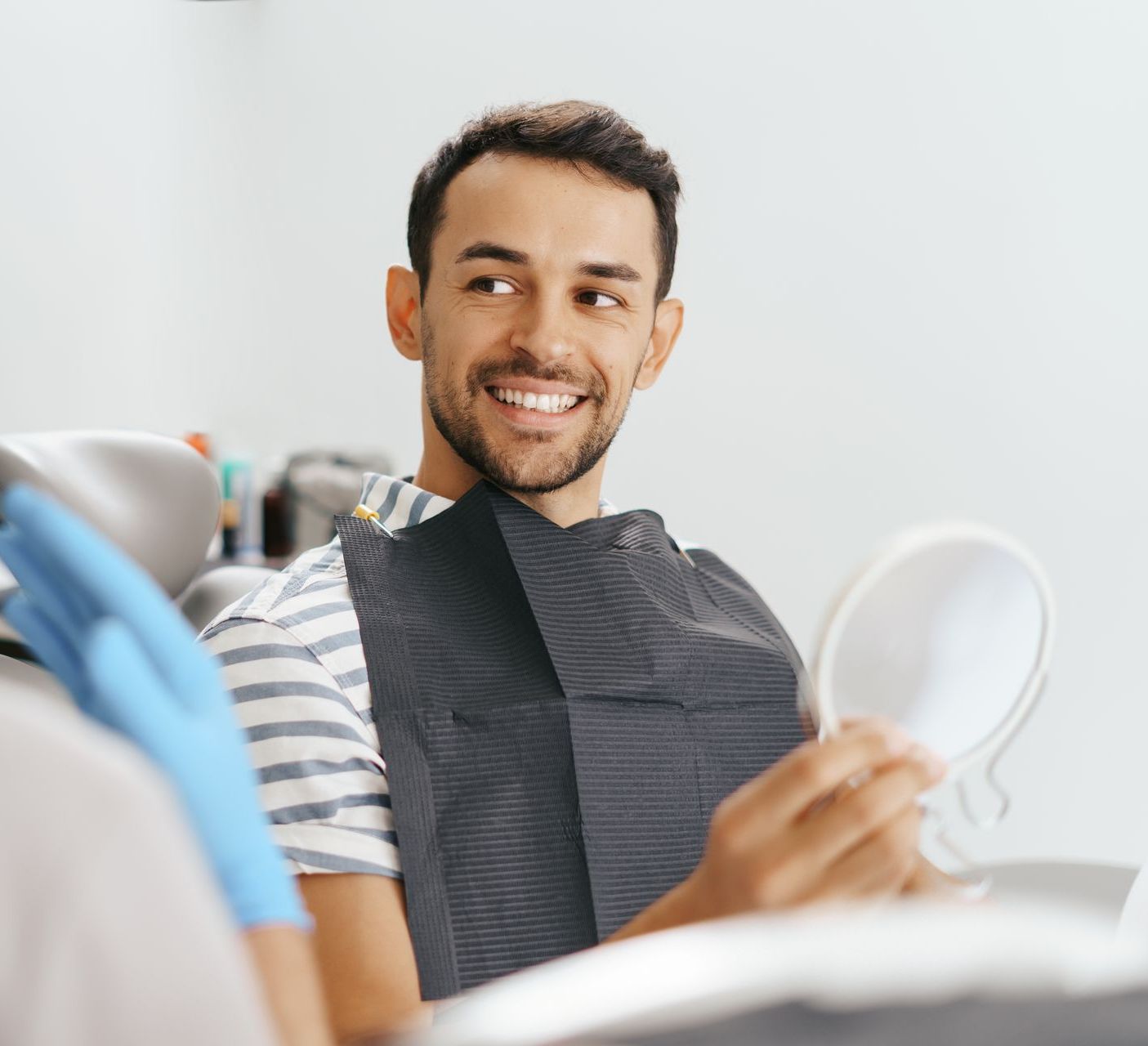 Get biological dental care in Somerset, NJ. Dental patient in chair smiling | Happy patients of our holistic natural dentist | Somerset NJ
