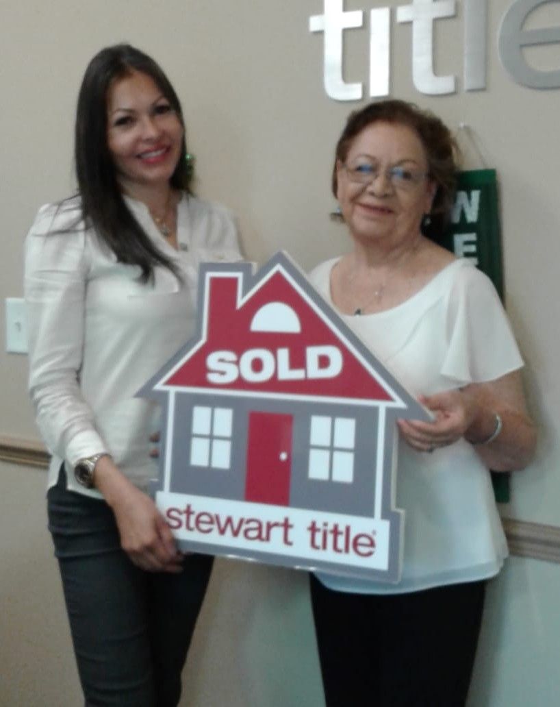 Two women holding a