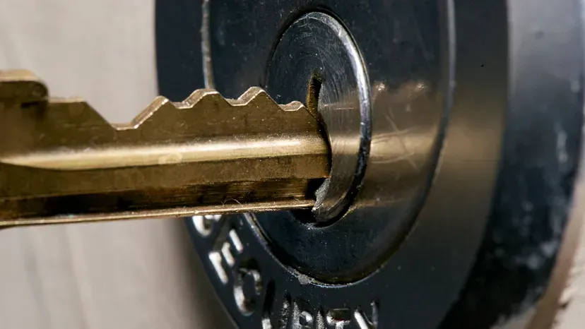A close up of a key in a lock.