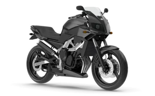 Black sport motorcycle with windshield, angled side view on white background