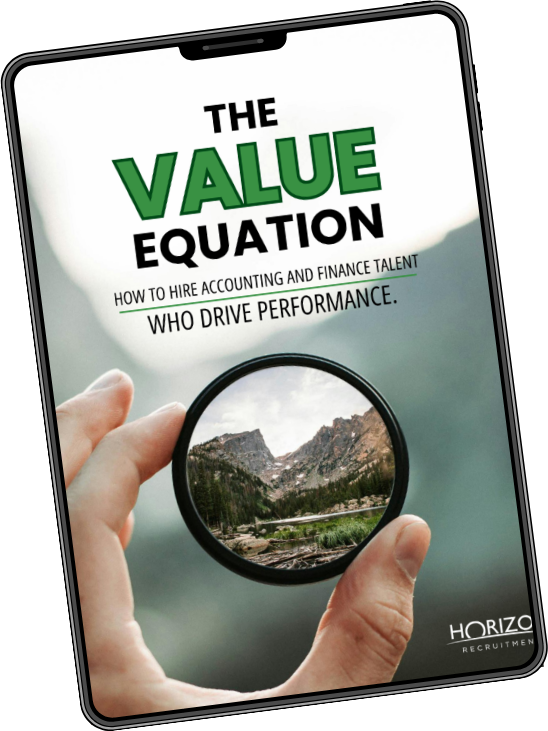 Hand holding a phone displaying “The Value Equation” with a mountain landscape on screen.