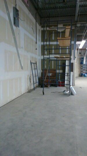 There is a scaffolding in the middle of the room.