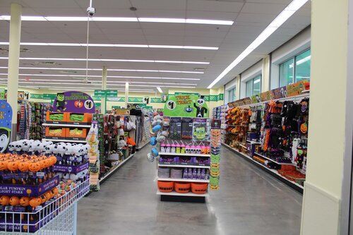 The inside of a store filled with lots of halloween decorations.