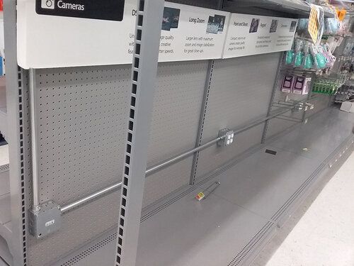 A store aisle with a sign that says carnegie on it