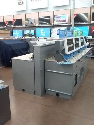 A store filled with lots of televisions and computers