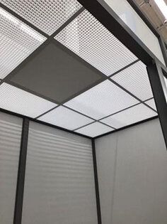 A close up of a ceiling in a room.