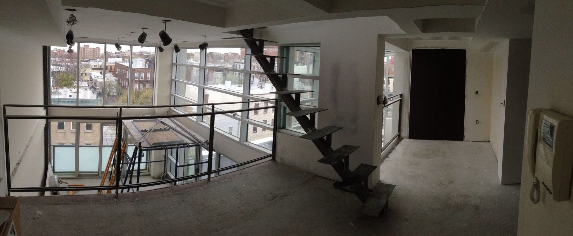 There is a staircase in the middle of the room.